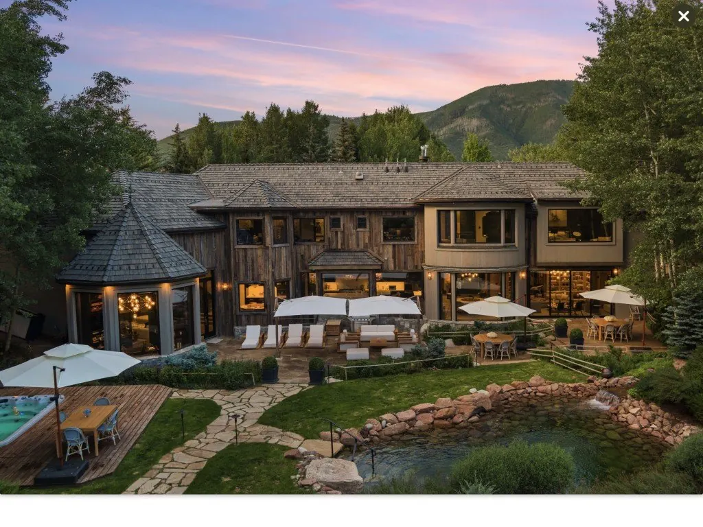 Contemporary timber home with a brown Brava Cedar Shake roof