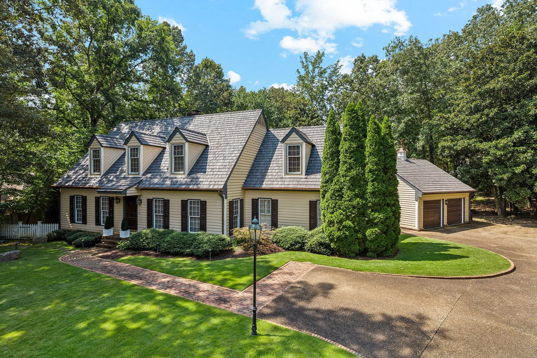 Traditional home with a dimensional slate-style roof
