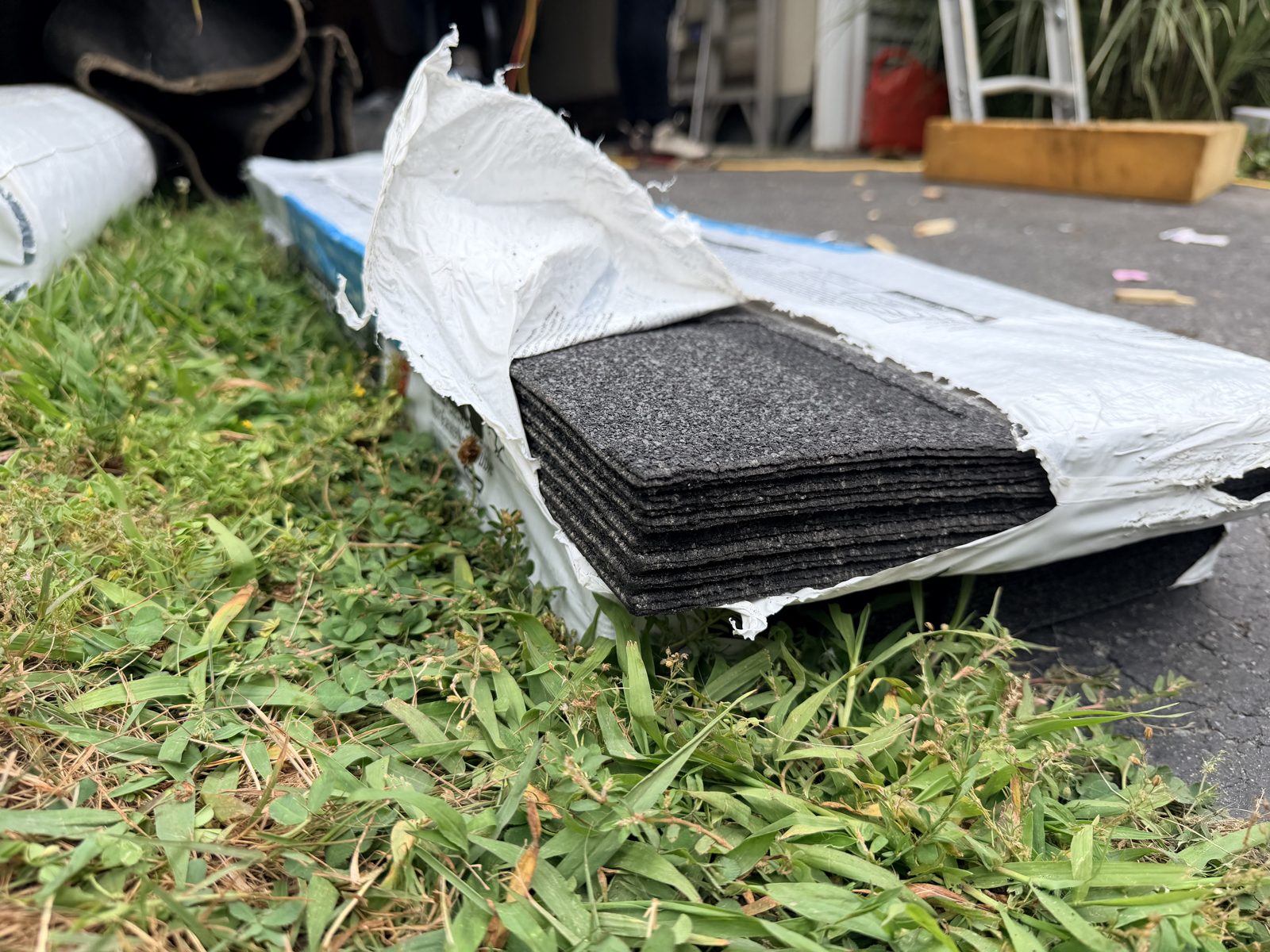 Open bundle of IKO Dynasty architectural shingles